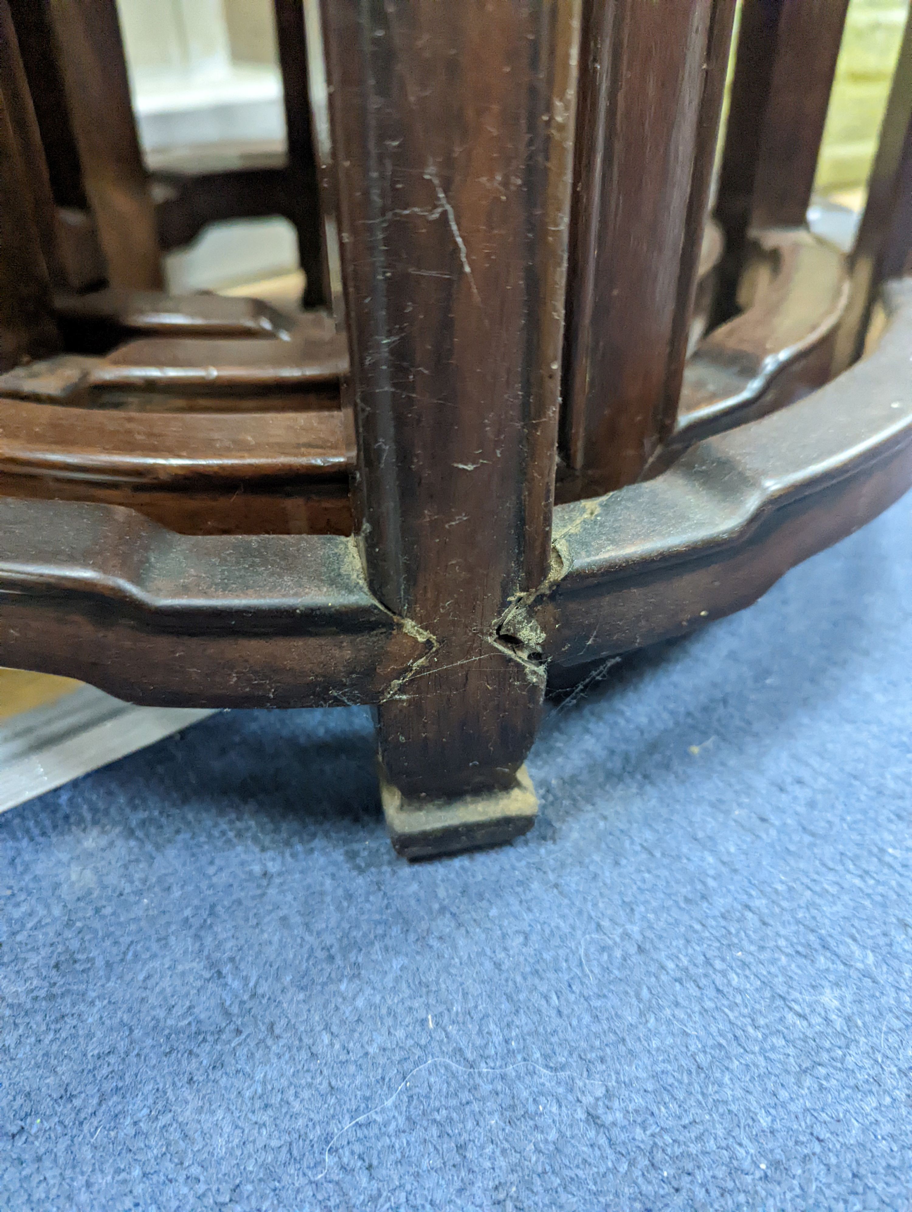 A nest of four Chinese hardwood circular tables, largest diameter 40cm, height 67cm